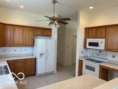 This lovely home enjoys a panoramic view of the Plum Creek Golf on Plum Creek Golf Club in Indiana - for sale on GolfHomes.com, golf home, golf lot