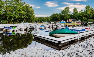 Discover an amazing, wooded lot in the picturesque Lake Royale on River Golf and County Club at Lake Royale in North Carolina - for sale on GolfHomes.com, golf home, golf lot