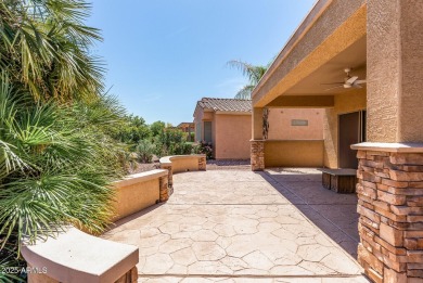 Handsome stone trimmed exterior! Desert Rose model offers an on Cimarron Golf Club in Arizona - for sale on GolfHomes.com, golf home, golf lot