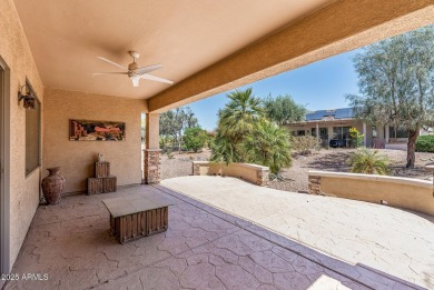 Handsome stone trimmed exterior! Desert Rose model offers an on Cimarron Golf Club in Arizona - for sale on GolfHomes.com, golf home, golf lot