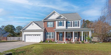 Welcome to your dream home in the serene and sought-after on Rock Creek Country Club in North Carolina - for sale on GolfHomes.com, golf home, golf lot