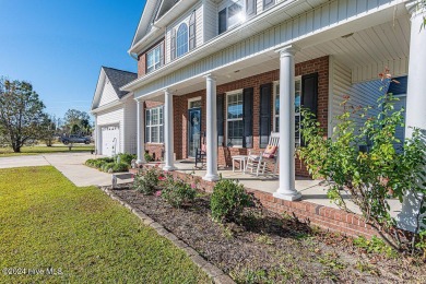 Welcome to your dream home in the serene and sought-after on Rock Creek Country Club in North Carolina - for sale on GolfHomes.com, golf home, golf lot