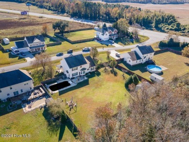 Welcome to your dream home in the serene and sought-after on Rock Creek Country Club in North Carolina - for sale on GolfHomes.com, golf home, golf lot