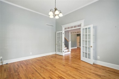 Overlooking manicured fairways and a sparkling lake, this home on The Golf Club At Bradshaw Farm in Georgia - for sale on GolfHomes.com, golf home, golf lot