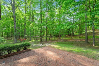 Welcome to your private retreat at 1032 Traders Trail, a on Hasentree Club in North Carolina - for sale on GolfHomes.com, golf home, golf lot