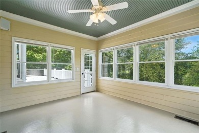 Overlooking manicured fairways and a sparkling lake, this home on The Golf Club At Bradshaw Farm in Georgia - for sale on GolfHomes.com, golf home, golf lot