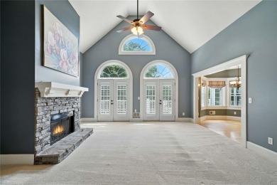 Overlooking manicured fairways and a sparkling lake, this home on The Golf Club At Bradshaw Farm in Georgia - for sale on GolfHomes.com, golf home, golf lot