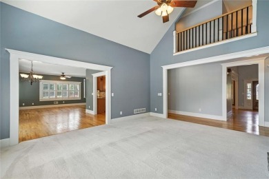 Overlooking manicured fairways and a sparkling lake, this home on The Golf Club At Bradshaw Farm in Georgia - for sale on GolfHomes.com, golf home, golf lot