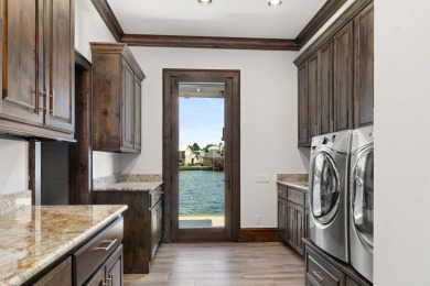 This is the benchmark by which all other Cedar Creek Lake homes on Pinnacle Golf and Boat Club in Texas - for sale on GolfHomes.com, golf home, golf lot