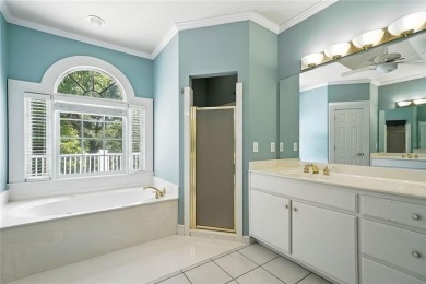 Overlooking manicured fairways and a sparkling lake, this home on The Golf Club At Bradshaw Farm in Georgia - for sale on GolfHomes.com, golf home, golf lot