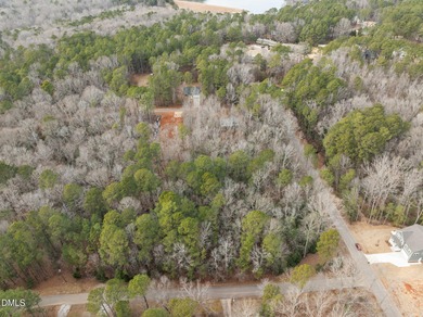 Build your dream home in this beautiful gated lake community! on River Golf and Country Club at Lake Royale in North Carolina - for sale on GolfHomes.com, golf home, golf lot