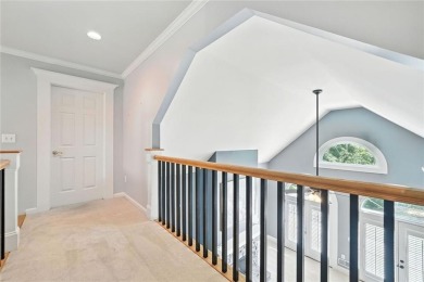 Overlooking manicured fairways and a sparkling lake, this home on The Golf Club At Bradshaw Farm in Georgia - for sale on GolfHomes.com, golf home, golf lot