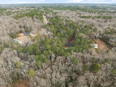 Build your dream home in this beautiful gated lake community! on River Golf and Country Club at Lake Royale in North Carolina - for sale on GolfHomes.com, golf home, golf lot