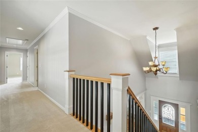 Overlooking manicured fairways and a sparkling lake, this home on The Golf Club At Bradshaw Farm in Georgia - for sale on GolfHomes.com, golf home, golf lot