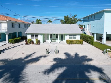 Welcome to your Key Colony Beach Escape, a beautifully on Key Colony Beach Golf Course in Florida - for sale on GolfHomes.com, golf home, golf lot