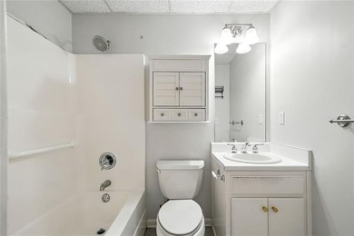 Overlooking manicured fairways and a sparkling lake, this home on The Golf Club At Bradshaw Farm in Georgia - for sale on GolfHomes.com, golf home, golf lot