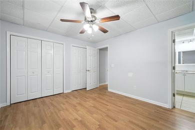 Overlooking manicured fairways and a sparkling lake, this home on The Golf Club At Bradshaw Farm in Georgia - for sale on GolfHomes.com, golf home, golf lot