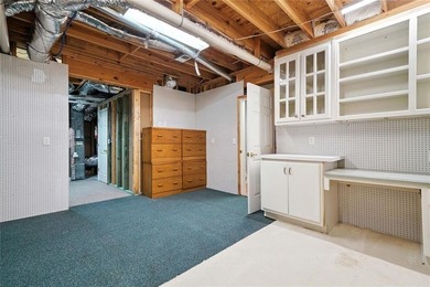 Overlooking manicured fairways and a sparkling lake, this home on The Golf Club At Bradshaw Farm in Georgia - for sale on GolfHomes.com, golf home, golf lot