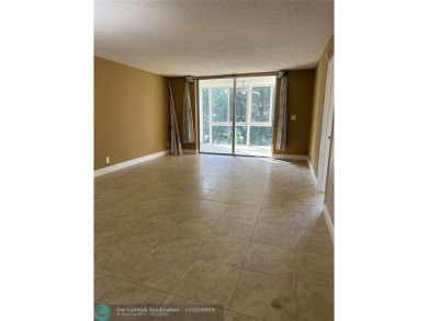 Located in the 55+ community of Palm Springs 2, this spacious 2 on Oriole Golf and Tennis Club in Florida - for sale on GolfHomes.com, golf home, golf lot
