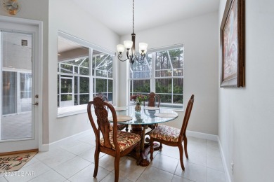 Gorgeous pool home nestled on a quiet street in the highly on Plantation Bay Golf and Country Club in Florida - for sale on GolfHomes.com, golf home, golf lot
