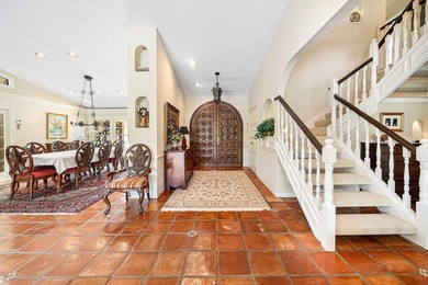 Extraordinary panoramic lake, sunset, and golf views from this on PGA National Golf Club in Florida - for sale on GolfHomes.com, golf home, golf lot