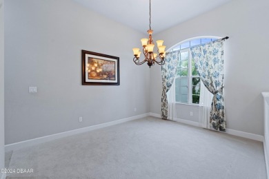Gorgeous pool home nestled on a quiet street in the highly on Plantation Bay Golf and Country Club in Florida - for sale on GolfHomes.com, golf home, golf lot