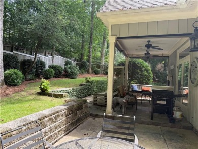 Nestled on a serene, wooded lot with immaculate landscaping and on Moores Mill Golf Club in Alabama - for sale on GolfHomes.com, golf home, golf lot