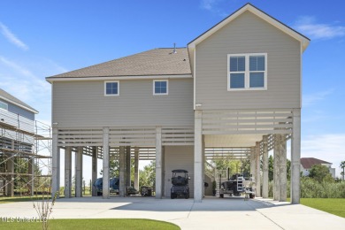 Waterfront Home in Diamondhead!This beautifully crafted on Diamondhead Country Club in Mississippi - for sale on GolfHomes.com, golf home, golf lot