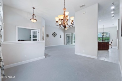Gorgeous pool home nestled on a quiet street in the highly on Plantation Bay Golf and Country Club in Florida - for sale on GolfHomes.com, golf home, golf lot
