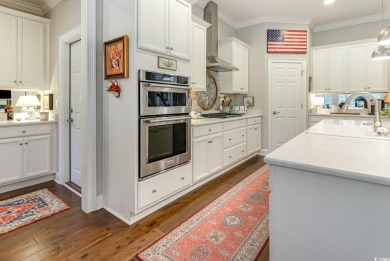 Step into the lap of luxury in this stunning 4-bedroom on Pawleys Plantation Golf and Country Club in South Carolina - for sale on GolfHomes.com, golf home, golf lot