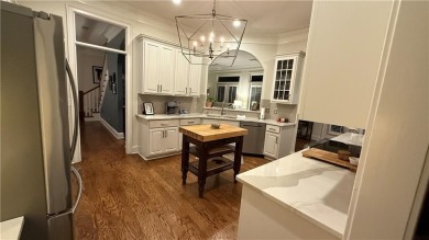 Nestled on a serene, wooded lot with immaculate landscaping and on Moores Mill Golf Club in Alabama - for sale on GolfHomes.com, golf home, golf lot