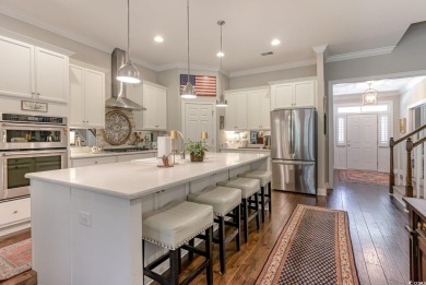 Step into the lap of luxury in this stunning 4-bedroom on Pawleys Plantation Golf and Country Club in South Carolina - for sale on GolfHomes.com, golf home, golf lot