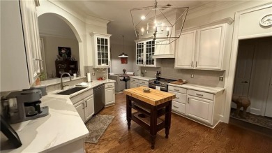 Nestled on a serene, wooded lot with immaculate landscaping and on Moores Mill Golf Club in Alabama - for sale on GolfHomes.com, golf home, golf lot