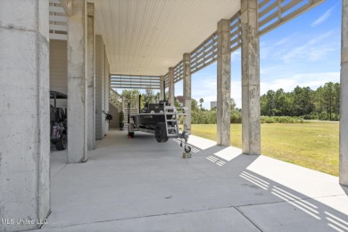 Waterfront Home in Diamondhead!This beautifully crafted on Diamondhead Country Club in Mississippi - for sale on GolfHomes.com, golf home, golf lot