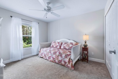 Gorgeous pool home nestled on a quiet street in the highly on Plantation Bay Golf and Country Club in Florida - for sale on GolfHomes.com, golf home, golf lot
