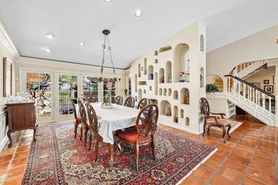 Extraordinary panoramic lake, sunset, and golf views from this on PGA National Golf Club in Florida - for sale on GolfHomes.com, golf home, golf lot