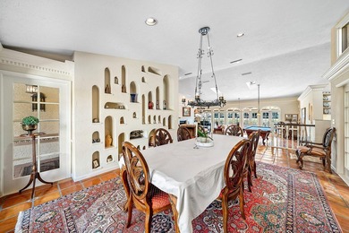 Extraordinary panoramic lake, sunset, and golf views from this on PGA National Golf Club in Florida - for sale on GolfHomes.com, golf home, golf lot