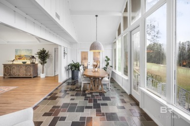 Open and airy Lake Forest golf course home with fortified roof! on Lake Forest Yacht and Country Club in Alabama - for sale on GolfHomes.com, golf home, golf lot