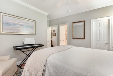 Step into the lap of luxury in this stunning 4-bedroom on Pawleys Plantation Golf and Country Club in South Carolina - for sale on GolfHomes.com, golf home, golf lot