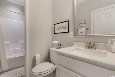 Step into the lap of luxury in this stunning 4-bedroom on Pawleys Plantation Golf and Country Club in South Carolina - for sale on GolfHomes.com, golf home, golf lot