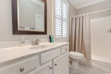 Step into the lap of luxury in this stunning 4-bedroom on Pawleys Plantation Golf and Country Club in South Carolina - for sale on GolfHomes.com, golf home, golf lot