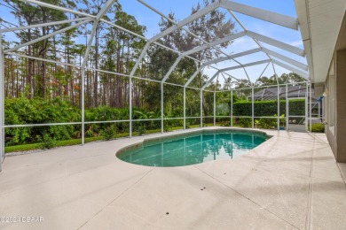 Gorgeous pool home nestled on a quiet street in the highly on Plantation Bay Golf and Country Club in Florida - for sale on GolfHomes.com, golf home, golf lot
