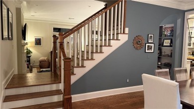 Nestled on a serene, wooded lot with immaculate landscaping and on Moores Mill Golf Club in Alabama - for sale on GolfHomes.com, golf home, golf lot