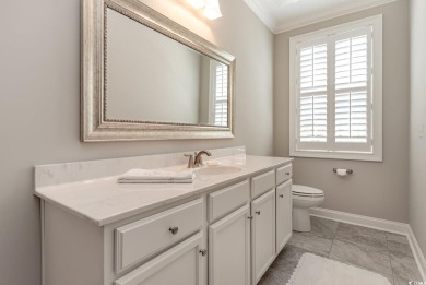 Step into the lap of luxury in this stunning 4-bedroom on Pawleys Plantation Golf and Country Club in South Carolina - for sale on GolfHomes.com, golf home, golf lot