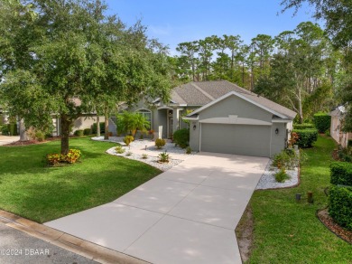 Gorgeous pool home nestled on a quiet street in the highly on Plantation Bay Golf and Country Club in Florida - for sale on GolfHomes.com, golf home, golf lot