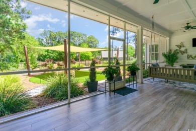 Step into the lap of luxury in this stunning 4-bedroom on Pawleys Plantation Golf and Country Club in South Carolina - for sale on GolfHomes.com, golf home, golf lot
