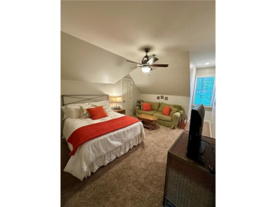 Nestled on a serene, wooded lot with immaculate landscaping and on Moores Mill Golf Club in Alabama - for sale on GolfHomes.com, golf home, golf lot