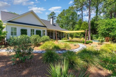 Step into the lap of luxury in this stunning 4-bedroom on Pawleys Plantation Golf and Country Club in South Carolina - for sale on GolfHomes.com, golf home, golf lot