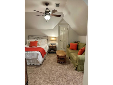 Nestled on a serene, wooded lot with immaculate landscaping and on Moores Mill Golf Club in Alabama - for sale on GolfHomes.com, golf home, golf lot