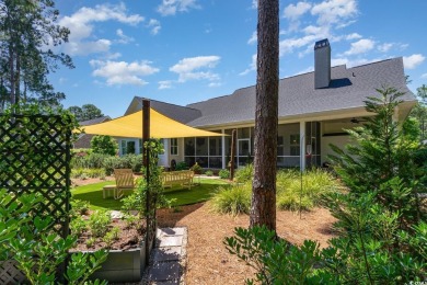 Step into the lap of luxury in this stunning 4-bedroom on Pawleys Plantation Golf and Country Club in South Carolina - for sale on GolfHomes.com, golf home, golf lot